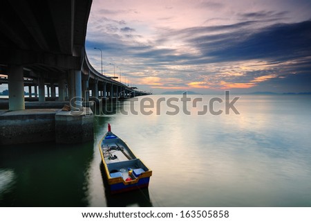 Boat Under The Penang Bridge
