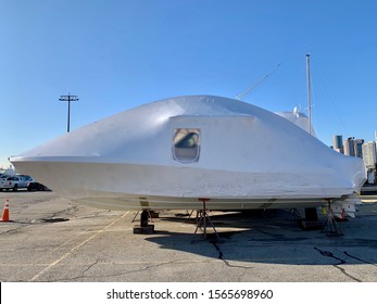 Boat Under White Shrink Wrap For Winter