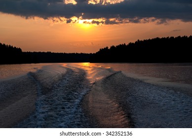 Boat Wake At Sunset In Northern Ontario