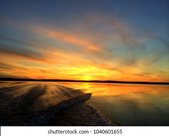 Boat Wake Sunset In Sweden