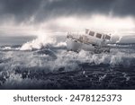 A boat is in the water and is being pushed by the waves