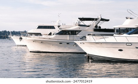 boat, yacht, sea, water, boats, luxury, harbor, ship, marina, port, sailing, travel, nautical, ocean, dock, sky, vessel, summer, yachts, sailboat, vacation, pier, sail, harbour, motorboat, seattle, wa - Powered by Shutterstock