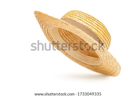 Boater straw hat flying isolated in studio. Concept of fashion clothing accessories and beach holidays Foto d'archivio © 
