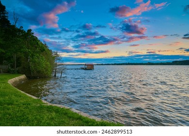 Boathouse on Lake Tyler, Texas with colorful clouds. - Powered by Shutterstock