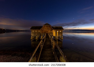 Boathouse in the village of Stegen, Lake Ammersee, Bavaria, Germany, at night - Powered by Shutterstock