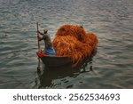 A boatman  in Buriganga river.