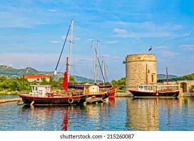 Boats Anchored In Harbor Mali Ston By The Old Tower Toljevac Whitch Is The Part Of Remains Of The Ancient Walls And Fortress.