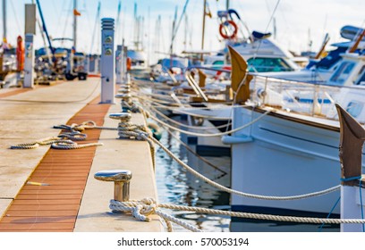 Boats anchoring at the marina of Porto Colom, Spain Majorca, Mediterranean Sea.