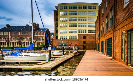 Boats and buildings on the waterfront in Fells Point, Baltimore, Maryland.