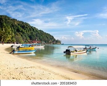 Boats in Coral Bay beach, Perhentian Kecil Island, Malaysia.