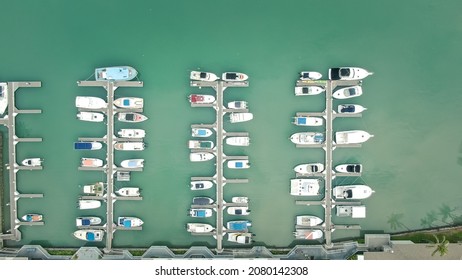 Boats At Dock In A Small Boat Harbor, Viewed From Above Drone Photo In Hawaii Kai, Koko Marine, Oahu