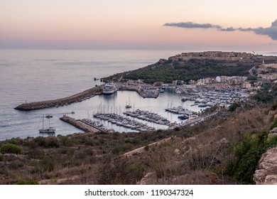 Boats In The Harbour With The Gozo Ferry Mgarr.Horizontal. Above View  September 2018