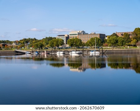 Boats moored along the Penobscot River in Bangor Maine.