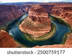 Boats on the Colorado River at Horseshoe Bend in Arizona