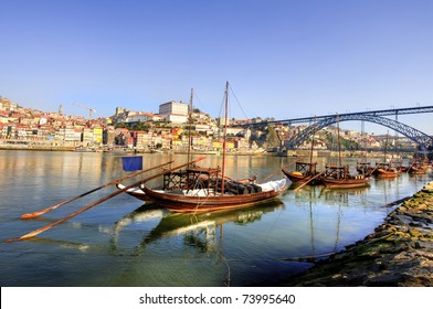 Boats On Douro River In Porto Portugal - Morningview Of Ribeira