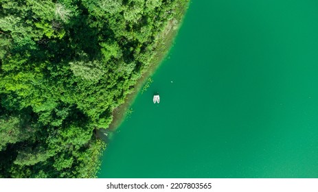 Boats On The Green Lake. Aerial Drone View.