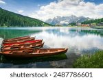 Boats on the Lake Misurina and Dolomites mountains. Auronzo di Cadore, province of Belluno, Veneto region, Italy, Europe.