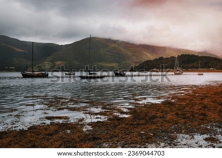 Boats on Loch Leven at Glencoe in the highlands of Scotland