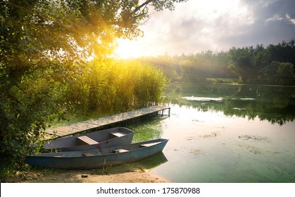 Boats On River At Beautiful Summer Sunrise