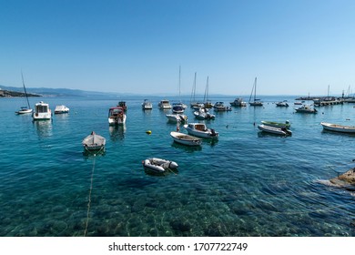 Boats on the water off the coast of Volosko, Croatia.