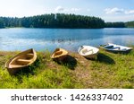 Boats parked on the shore of the Ahvenlampi lake, Finland