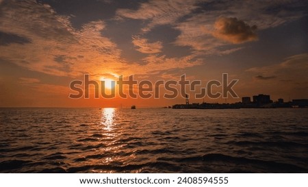 Boats sailing and moored on the Rio Negro in the Port of Manaus Amazonas Brazil