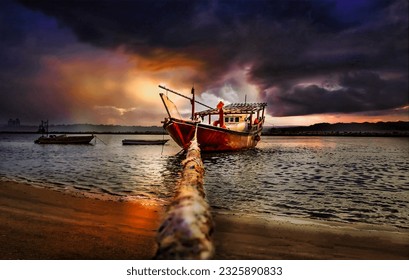 Boats in seaside with Dramatic Sunset cloud background in Dammam Corniche -Saudi Arabia.