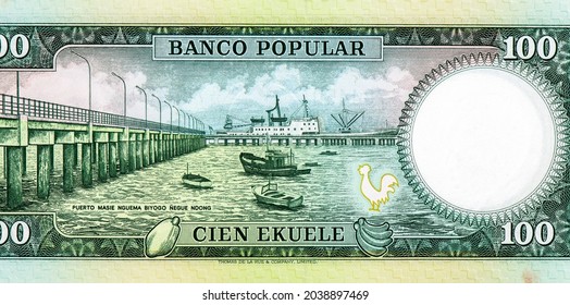 Boats and ships in the Port of Masie Nguema Biyogo Negue Ndong; now Port of Bata. Cocoa fruit and bananas. Portrait from Equatorial Guinea 100 Ekuele 1975 Banknotes.