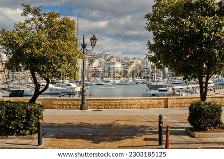 Boats, ships and promenade without people in Marina Zeas in Pireas, Athens, Greek, Europe