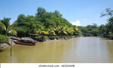 Boats At The Shore Of Bakkie Village In Suriname