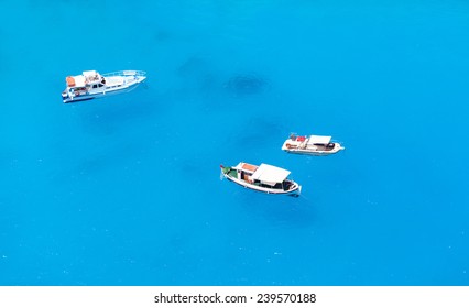 Boats and yachts in crystal clear turquoise water