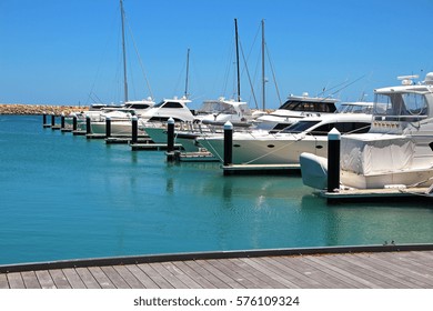 Boats and yachts in a marina.