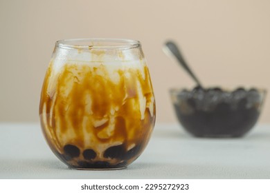 Boba brown sugar, also known as brown sugar boba. It is made by coating traditional tapioca pearls in a brown sugar syrup, which gives them a sweet and slightly caramelized flavor and a brownish color