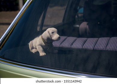 Bobblehead Dachshund, In German Wackeldackel, On The Parcel Shelf In The Car, A Popular Accessory In The 1970s, Copy Space, Selected Focus,