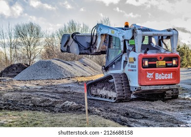 Bobcat Skid Steer Loader With Rubber Tracks At A New Park Under Construction. Panevezys Lithuania In February 19 D. 2022