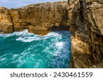 Boca do Inferno, or the mouth of Hell is a chasm located in the seaside cliffs close to the city of Cascais, Portugal, in the District of Lisbon, where seawater rushes in and out of a rocky opening.	