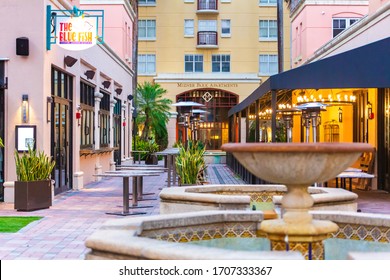 Boca Raton, Florida/USA - April 18, 2020: Mizner Park lifestyle center in downtown Boca Raton, Florida at sunrise. Empty streets and shops view. All business closed at early morning.