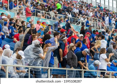 Boca Raton, Florida/USA - December 21, 2019: Florida Atlantic Owls Vs SMU Mustangs. Cheribundi Boca Raton Bowl 2019. Peoples On Stadium Support Own Football Team.