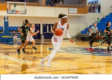 Boca Raton, Florida/USA - January 11, 2020: Florida Atlantic Owls Vs North Texas Women's Basketball C-USA Conference. College Basketball. Players On Basketball Court.