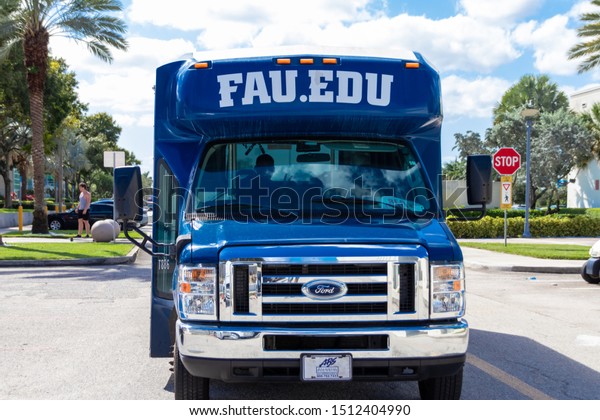 Boca\
Raton, Florida/USA - September 23, 2019: FAU Owl Express Shuttle.\
Transportation Services provides a free on-campus shuttle service\
designed to help move people quickly around\
campus.