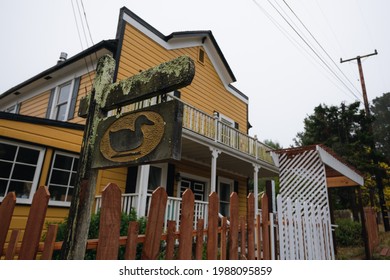 Bodega Bay, California - October 19, 2019: A Wooden Duck Sign Outside Of A Building.