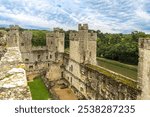 Bodiam Castle is a 14th-century moated castle near Robertsbridge in East Sussex, England. It was built in 1385 by Sir Edward Dalyngrigge to defend against French invasion during the Hundred Years war.