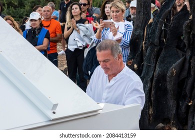 Bodrum, Cokertme, Turkey, 10212021; Pianist, Kerem Gorsev Playing Live Open Air On White Piano. Jazz Concert At 