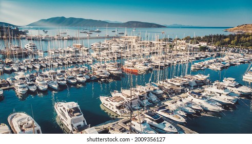 Bodrum Cruise Port southwestern Aegean sea harbor. A stunning view of sailing yachts in Port. Yachts in sunset bay. Sailing boats sunset scene. Sunset yachts view. Yachts in sunset bay. 