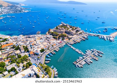 Bodrum District of Mugla, Turkey. Aerial view of Bodrum Castle (Castle of St. Peter). Panoramic view of Bodrum center, marina and castle. Drone shot. - Powered by Shutterstock