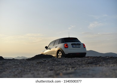 Bodrum / Turkey - 10.11.19: White Car Mini Cooper D On Test Drive In Mountains