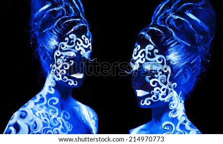 Body art glowing in ultraviolet light,  four elements - air