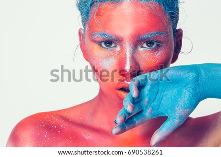 Body art woman face portrait, pink skin with beautiful beauty blue hair, art concept