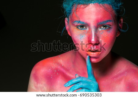 Body art woman pink face beauty with blue hair and hand. Beautiful art skin