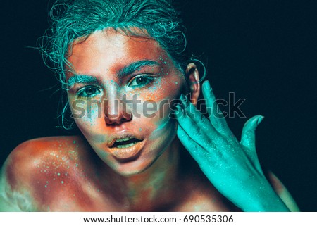Body art woman pink face beauty with blue hair and hand. Beautiful art skin